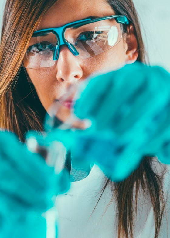 Scientist with test tubes